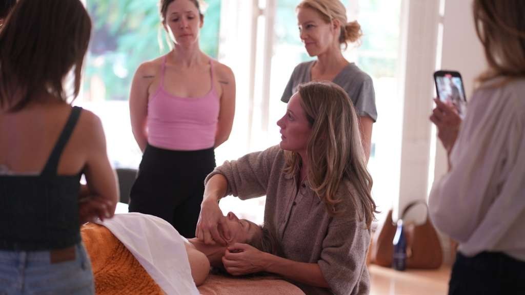 Abi Maeve leading a Sculptural Face Lifting certification training